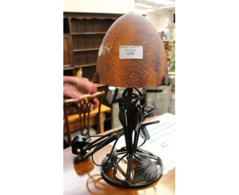 Art Nouveau domed glass table lamp upon a foliate design wrought iron base