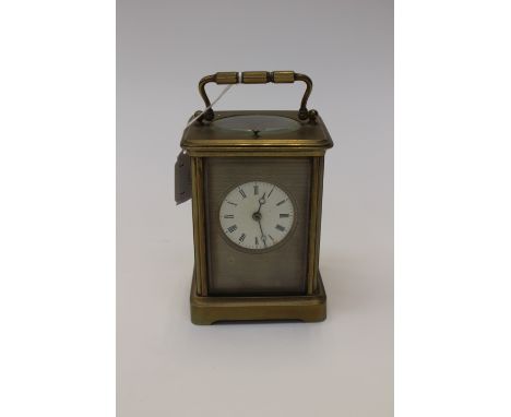 Brass carriage clock marked 'Brevetes, GD, HA', enamel dial with Roman numerals