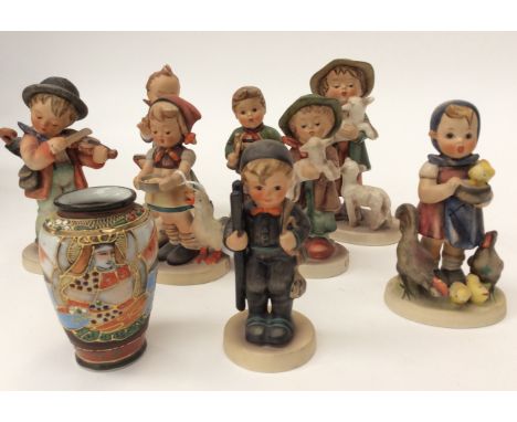Eight Goebel Thummel figures together with one French trinket pot (9)