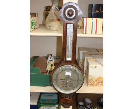 The Wilsn Forecast barometer and thermometer oak cased, with a silvered dial, reg no: 710284, British made, Birmingham and Co