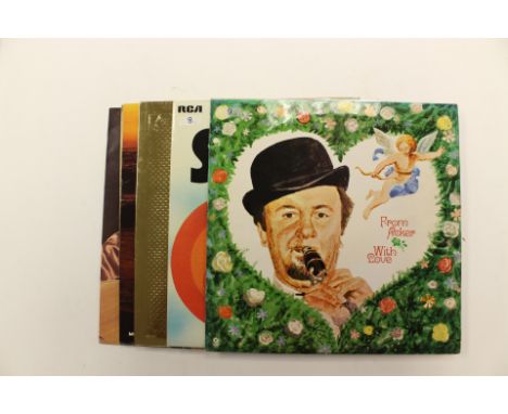 A box and a bag containing a large quantity of various records, 33 rpm, mostly containing pop from the 1960s and 70s, includi