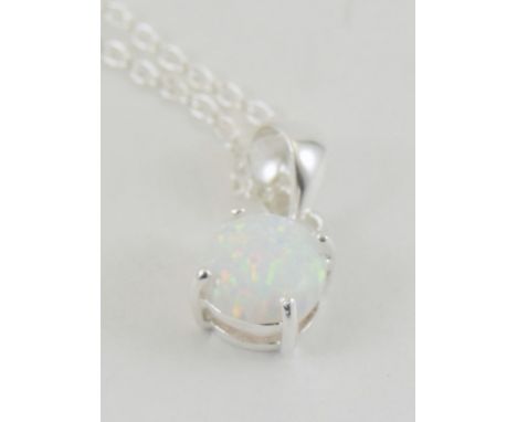 A silver and drop opal pendant necklace