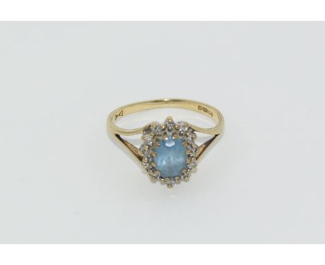 9ct gold ladies diamond and aquamarine cluster ring size K