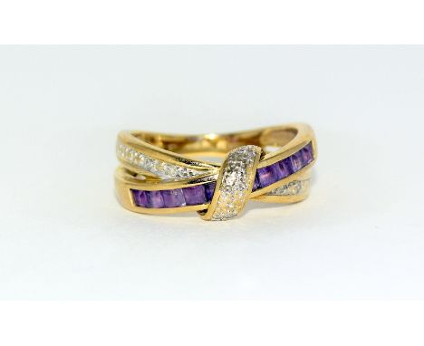 9ct gold ladies diamond and pink topaz cross over ring size K