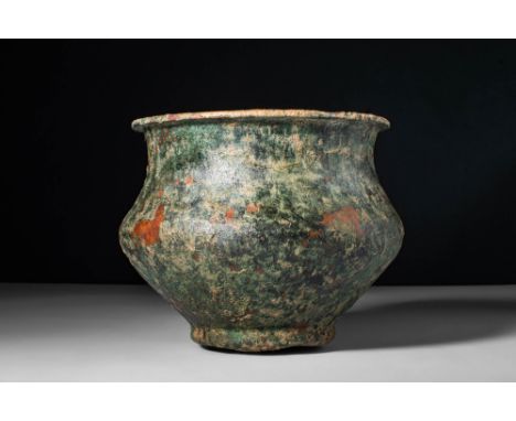 Ca. 500 - 300 BC.An Etruscan cast-bronze vessel with a carinated body, small discoid base and a large neck connected to a sho