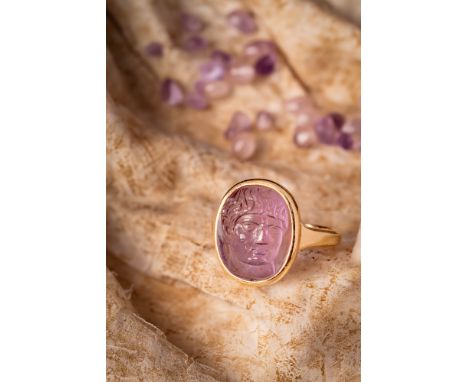 Ca. AD 300 - 350.A late Roman large oval amethyst cameo depicting Constantine the Great, Emperor from 306 to 337 AD and the f