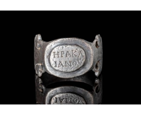 Ca. AD 400 - 600.A Byzantine open-work silver ring with D section adorned with a phytomorphic motif. On the shoulders of the 