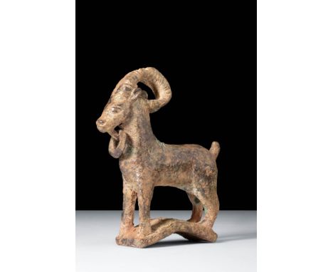 Ca. 800 - 600 BC.A charming Greek or Western Asiatic bronze statuette of a goat. The statuette is shown standing on a rectang