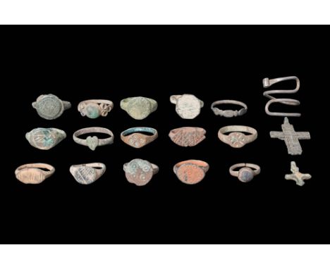 Ca. AD 700 - 1700.A large collection of Medieval bronze, silver, and glass jewellery. It is composed of fifteen rings with di