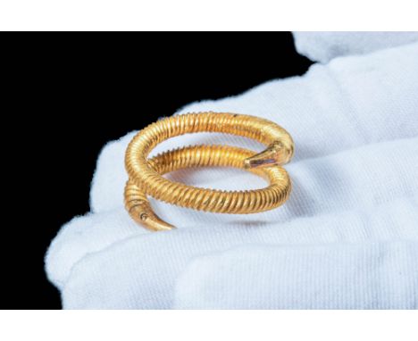 Ca. 300 - 100 BC. A solid gold Celtic hair ring, moulded from a single rod of gold. The ring has a tubular body embellished w