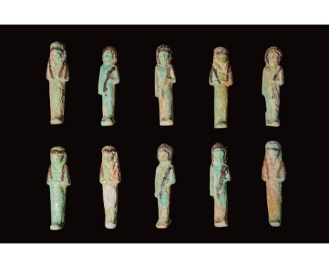 Third Intermediate Period, Ca. 1069 - 664 BC.A collection of ten faience ushabti covered in layers of reflective green hued g