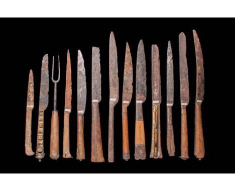 Ca. AD 1400 - 1700.A large collection of medieval and post medieval table knives and a fork. The knives have different blades