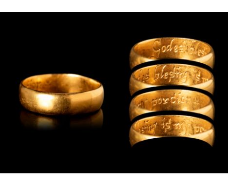 Ca. AD 1600. An Elizabethan or Stuart gold posy ring with an internal inscription reading “Godes blesing is my pordion” (God’