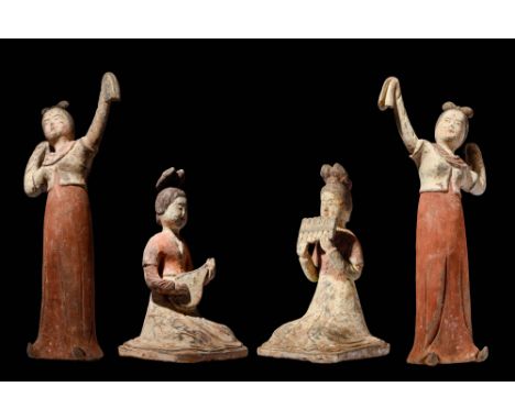 Ca. AD 619 - 906.A collection of Tang dynasty terracotta entertainers. The collection consists of two dancers and two musicia