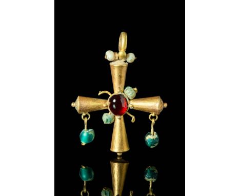 Ca. AD 700 - 900.A Byzantine solid gold cross, the conical arms taper toward the centre which are flat on their ends. In the 