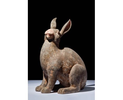 Ca. 202 BC - AD 220.A Han dynasty terracotta rabbit. The rabbit is modelled in a squatting pose, with its head facing forward