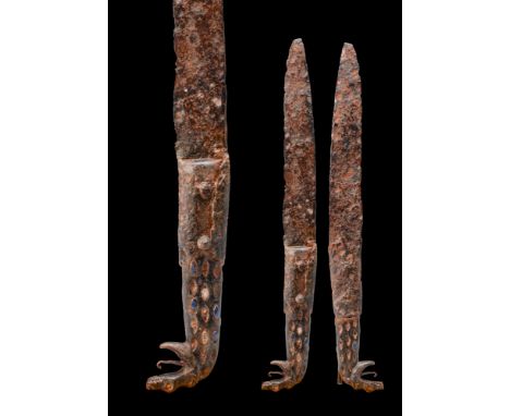Ca. AD 800 - 1100. A Viking iron knife with a wooden handle in the shape of a dragon’s head. The dragon’s head has an open mo