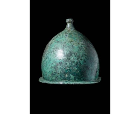 Ca. 100 BC - AD 100.A bronze Roman Montefortino helmet comprised of a single sheet of cast and hammered bronze. This type of 