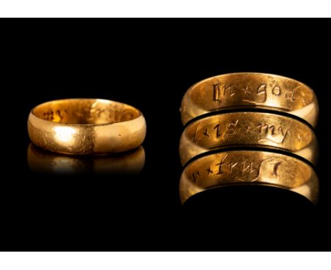 Ca. AD 1700. A post-medieval gold posy ring with an internal inscription reading “In god is my trust”. The inscription is mos