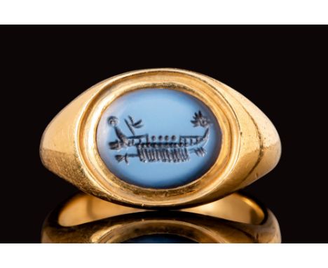 Ca. AD 100 - 300.A Roman oval nicolo intaglio depicting a Roman galley, including the heads of its rowers and its oars. At th