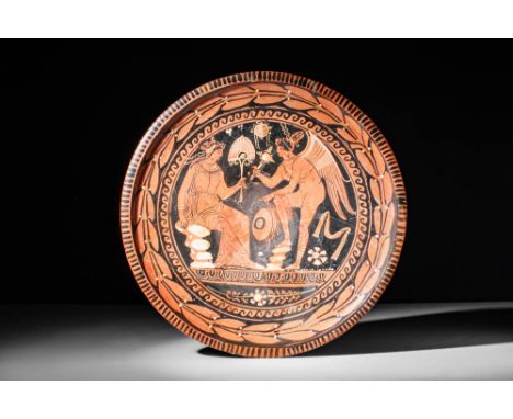 Ca. 330 - 300 BC.An attractive Apulian red-figure pottery patera attributed to the Baltimore painted. The patera is decorated