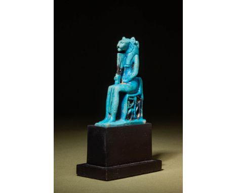 New Kingdom, Ca. 1550 - 1069 BC.A beautiful Egyptian bright blue faience amulet with black details depicting Sekhmet with a l