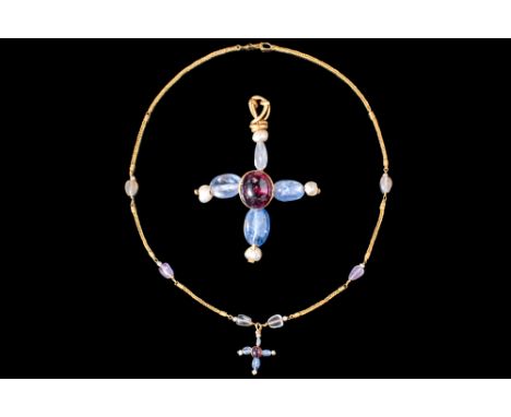 Ca. AD 900 - 1100. A rare Byzantine gold cross on a long chain with stones. The chain is adorned with six crystal stones. In 