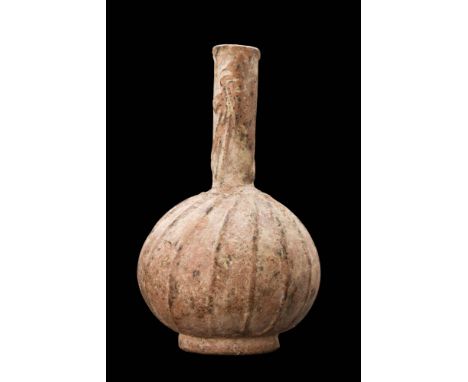 Ca. AD 700 - 900.A glass sprinkler flask boasting an onion-shaped lower body that gracefully flares into a long tubular neck 