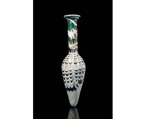Ca. 300 - 200 BC.A Hellenistic translucent black alabastron with white spiralling streaks. The alabastron has a long, conical