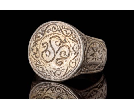 Ca. AD 1000 - 1300.A Byzantine solid silver gilt ring with a large round hoop with a D section that enlarges onto the shoulde