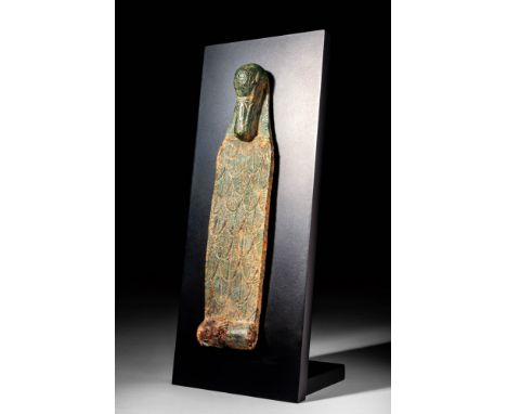 Late Period, Ca. 664 - 332 BC.An Egyptian bronze hinge in the shape of flat duck made in a naturalistic manner with its head 