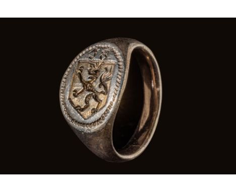 Ca. AD 1500 - 1600.A late medieval silver ring with a round hoop that widens on the shoulders to form an oval bezel, upon whi