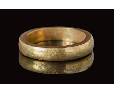 Ca. AD 400 - 600.A Saxon Era solid gold ring with a round polished hoop and a polygonal section. For similar see: British Mus