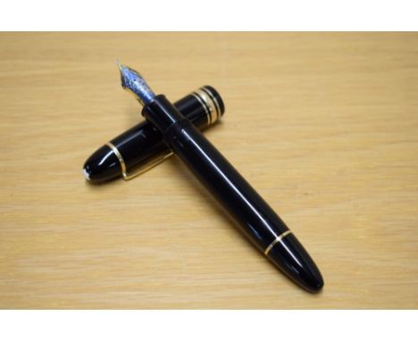 A Montblanc Meisterstuck 149 piston fill fountain pen (KB107600) in black with a braod and two narrow cap bands having Montbl