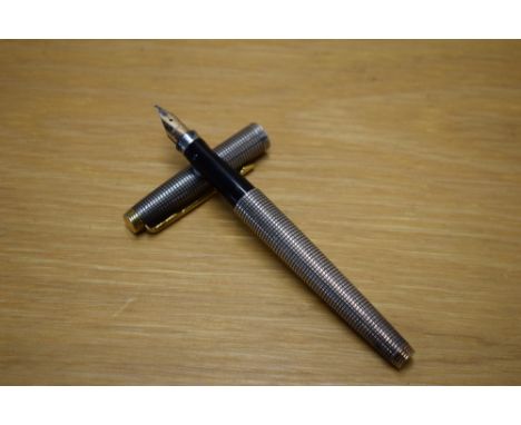 A Parker 75 Cisele converter fill fountain pen in Sterling Silver with gold trim having Parker 14K USA nib
Condition Report: 