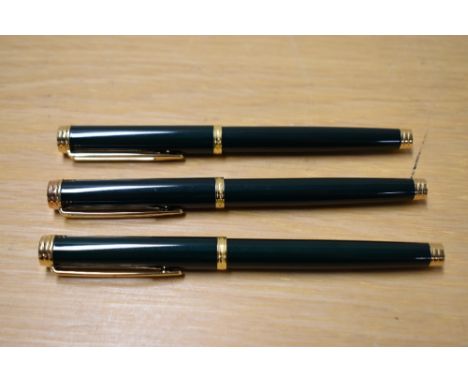 Two Waterman Gentleman cartridge converter fill fountain pens and a rollerball pen in Green Laque the fountain pens having Wa