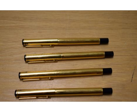 Three Parker Rialto converter fill fountain pens and a rollerball in Cornith Gold plate