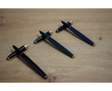 Three Parker 17 Super Duofold aerometric fill fountain pen in blue, black and green with gold trim