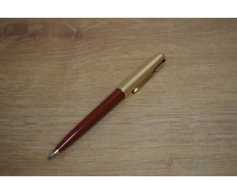A Parker 61ballpoint pen in Burgundy with Consort rolled gold cap