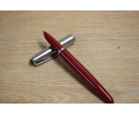 A Parker 41 aerometric fill fountain pen in red with lustraloy cap.