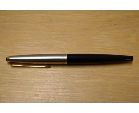 A Parker 45 cartridge fill fountain pen in black with lustraloy cap with gold trim