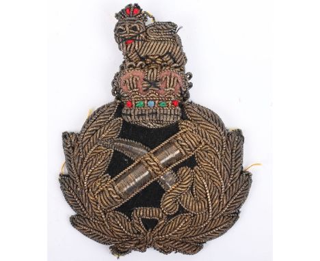 British Army Field Marshall Cap Badge: Heavy gilt wire padded cap badge with paper backing in good used condition. 