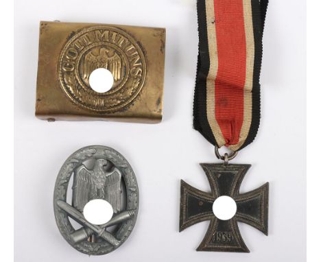 WW2 Style German Medals: German Iron Cross 2nd class, General assault combat badge and army belt buckle. We believe these to 