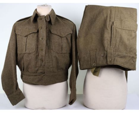 WW2 Canadian Battle Dress: Blouse with clear stampings dated 1944 complete buttons with Canadian made trousers we believe are