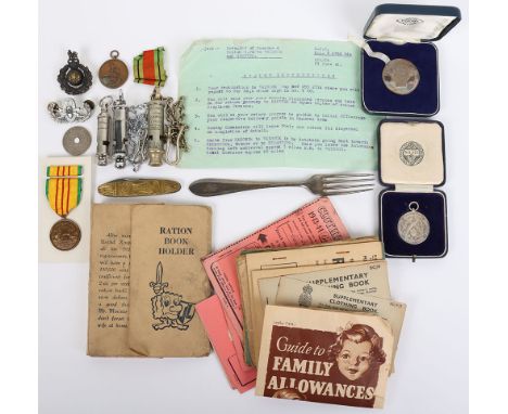 Militaria and Curious: WW2 and post war ration books, silver hallmarked shooting medal, coins ,US  Vietnam medal, whistles to