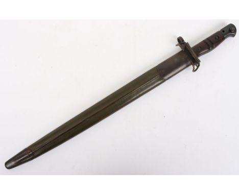 WW1 US Remington Bayonet: Bayonet with makers and Us armour marks, complete with green finish leather scabbard with belt clip