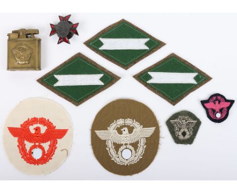 WW2 Style German Police Badges: Two cap eagles and two arm eagles ,breast award , brass lighter and  other cloth badges. We b