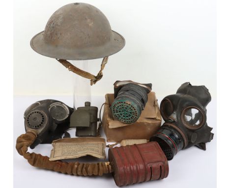 WW2 British Home Front Helmet and Gas masks:WW2 helmet with original paint, liner and chin strap, military and civil gas mask