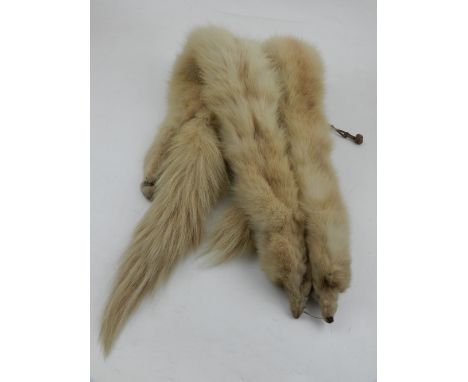 Two light mink fur scarfs