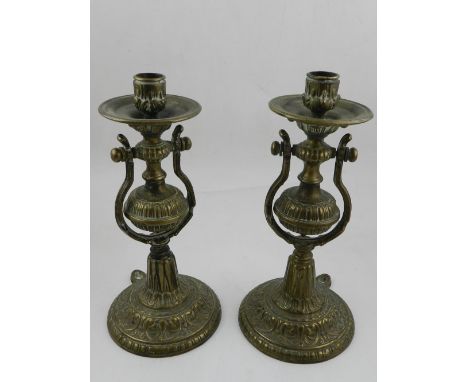 A pair of brass candlestick wall sconces. H. 28cm